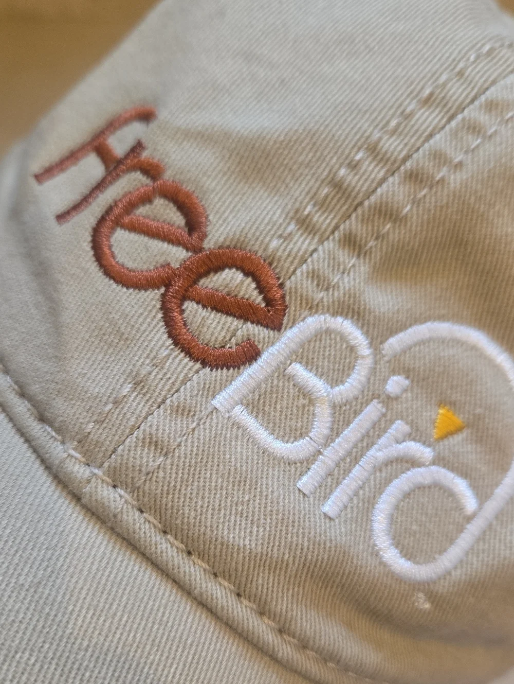 Free Bird Unisex Adjustable Tan Trucker Hat